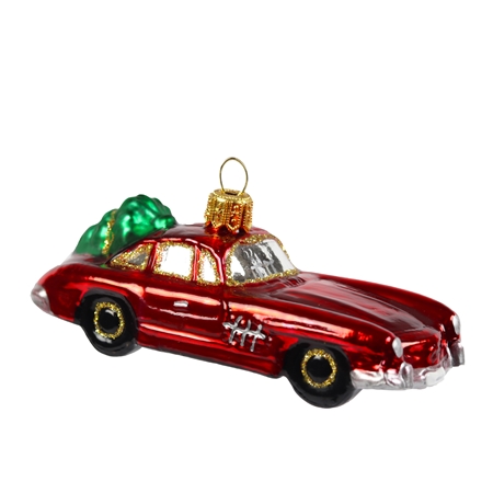 Décoration de Noël, voiture rouge avec un sapin